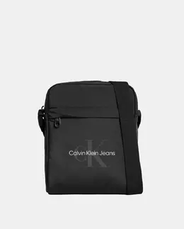 Calvin Klein: Чёрная поясная сумка 