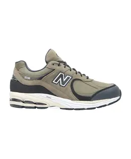 New Balance: Зелёные кроссовки 