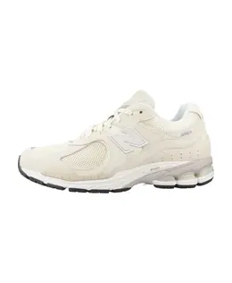 New Balance: Бежевые кроссовки 