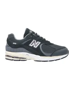 New Balance: Серые кроссовки 