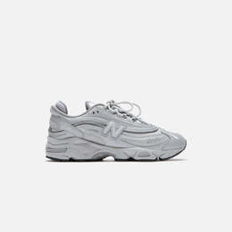 New Balance: Серебристые кроссовки 