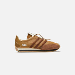 Adidas: Коричневые кроссовки  X