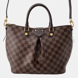 Louis Vuitton: Коричневая сумка 