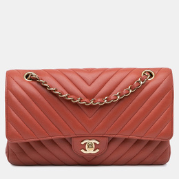 Chanel: Оранжевая сумка 