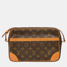 Louis Vuitton: Коричневая сумка через плечо 