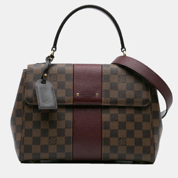 Louis Vuitton: Коричневая сумка 