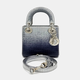 Dior: Серебристая сумка 
