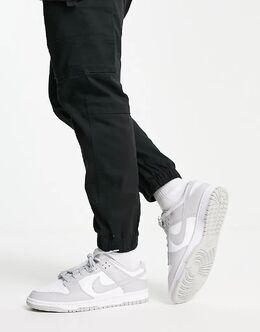 Nike: Серые кроссовки  Dunk Low