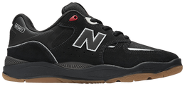 New Balance: Чёрные кроссовки  1010