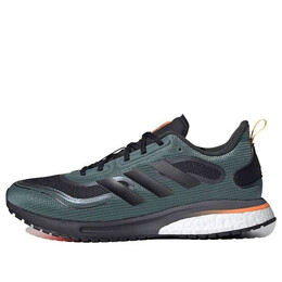 Adidas: Зелёные кроссовки  Supernova