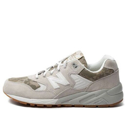 New Balance: Бежевые кроссовки 