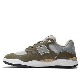 New Balance: Зелёные кроссовки  1010