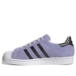 Adidas: Фиолетовые кроссовки 