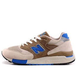 New Balance: Серые кроссовки 