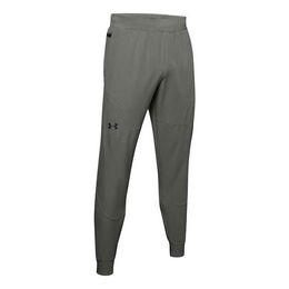 Under Armour: Зелёные брюки 