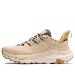 Hoka One One: Бежевые кроссовки 