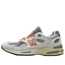 New Balance: Бежевые кроссовки 