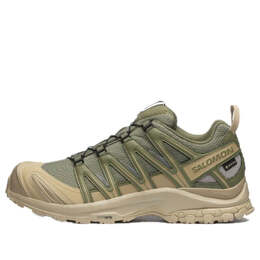 Salomon: Зелёные кроссовки 