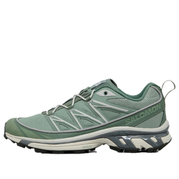 Salomon: Зелёные кроссовки 