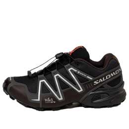 Salomon: Чёрные кроссовки 