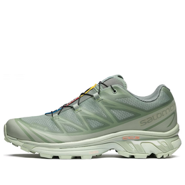 Salomon: Зелёные кроссовки 