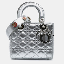 Dior: Серебристая сумка 