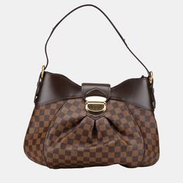 Louis Vuitton: Коричневая сумка 