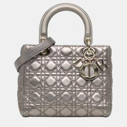 Dior: Серебристая сумка 