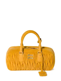 Miu Miu: Жёлтая сумка 