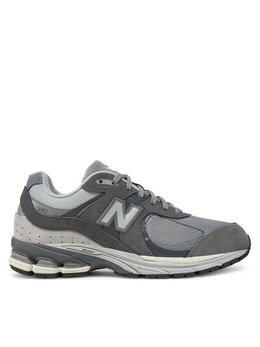 New Balance: Серые кроссовки 