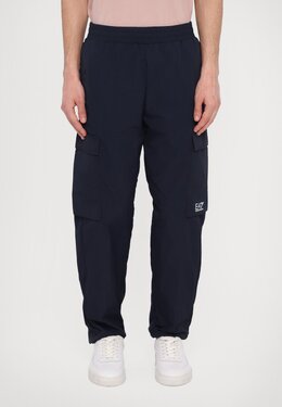 EA7 Emporio Armani: Синие брюки 