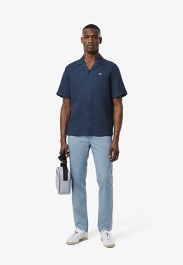 Lacoste: Синие брюки 
