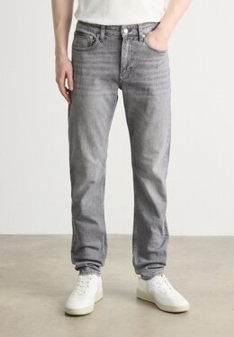 Calvin Klein Jeans: Зауженные джинсы 