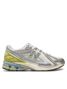 New Balance: Серые кроссовки 
