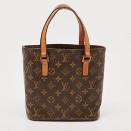 Louis Vuitton: Коричневая сумка 