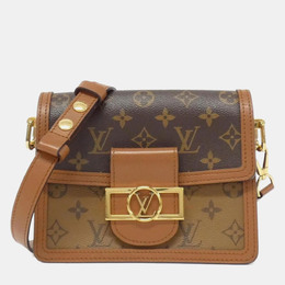 Louis Vuitton: Коричневая сумка 