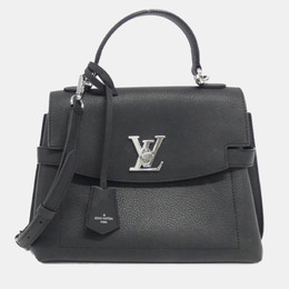 Louis Vuitton: Чёрная сумка 