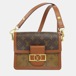 Louis Vuitton: Коричневая сумка 