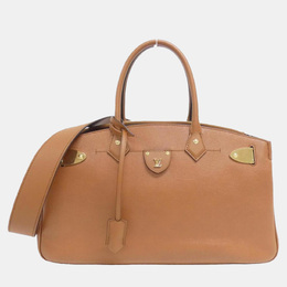 Louis Vuitton: Коричневая сумка 