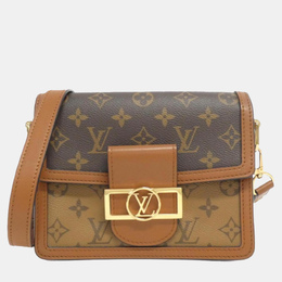 Louis Vuitton: Коричневая сумка 