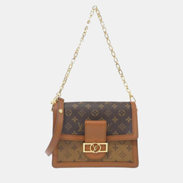 Louis Vuitton: Коричневая сумка 
