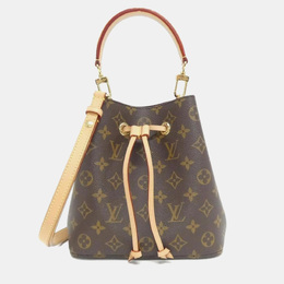 Louis Vuitton: Коричневая сумка 