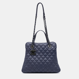 Chanel: Фиолетовая сумка-шоппер 