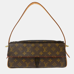 Louis Vuitton: Коричневая сумка 