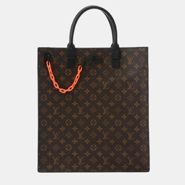 Louis Vuitton: Коричневая сумка-шоппер 
