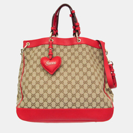 Gucci: Бежевая сумка  GG