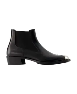 Alexander McQueen: Серебристые ботинки 