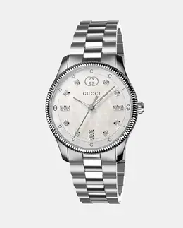 Gucci: Часы  G Timeless
