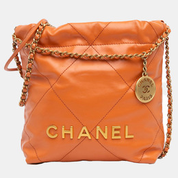 Chanel: Оранжевая сумка 