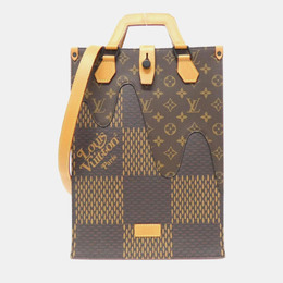 Louis Vuitton: Коричневая сумка-шоппер 